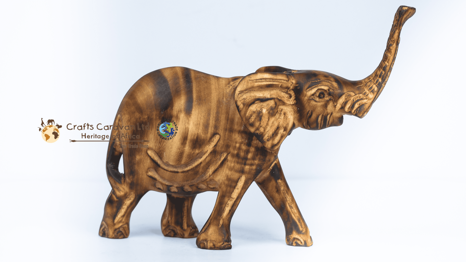Wooden elephant trunk up
